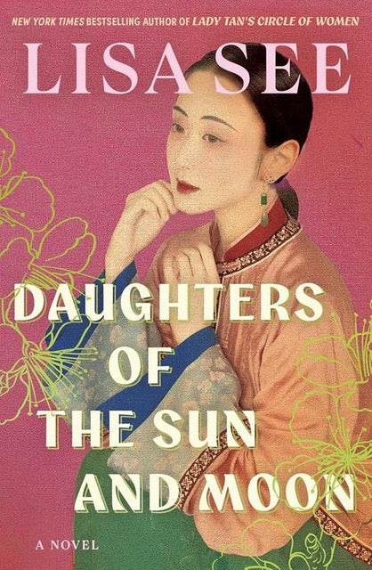 Book cover of 'Daughters of the Sun and Moon' by Lisa See with a woman's face and floral design.